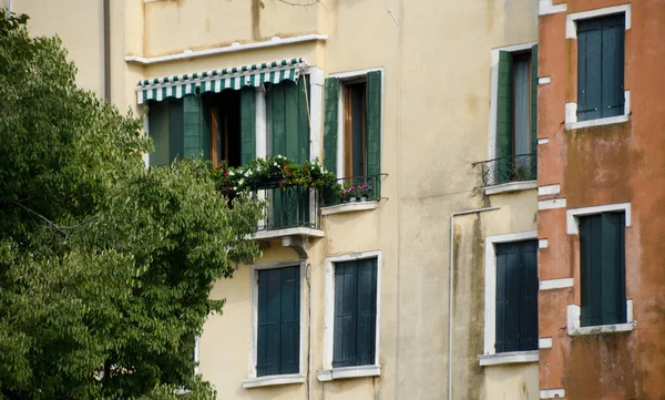 Picturesque walls and windows of Venetian Ghetto, Venice, Italy