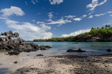 Waialea plajının sularına yansıyan muhteşem bulutlar