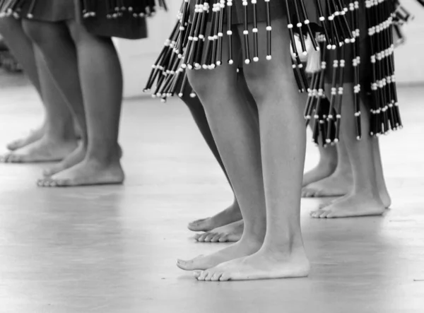 Legs of hula dancers performing in Waikoloa — Stock Photo, Image