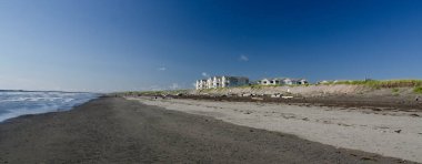 Sahile gidenler, Westport 'ta Point Chehalis yakınlarında bir tatil köyünde.