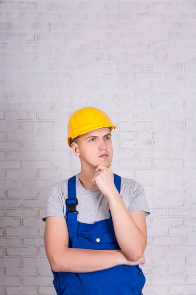 Builder Uniform Hard Hat Posing White Brick Wall — Stock Photo, Image