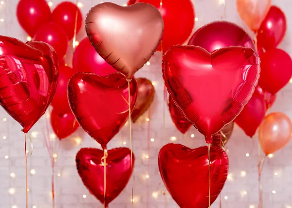 Valentine Day Background Red Foil Heart Shaped Balloons White Brick — Stock Photo, Image