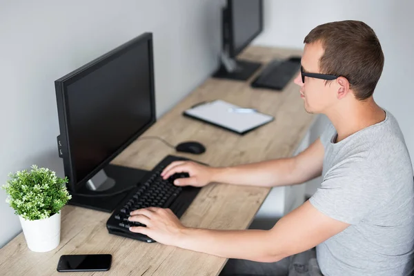 Side View Young Man Using Computer Home Work Blank Screen — Stock Photo, Image