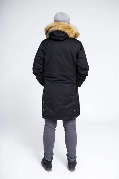 Visão Traseira Homem Posando Preto Casaco Inverno Quente Sobre Fundo — Fotografia de Stock