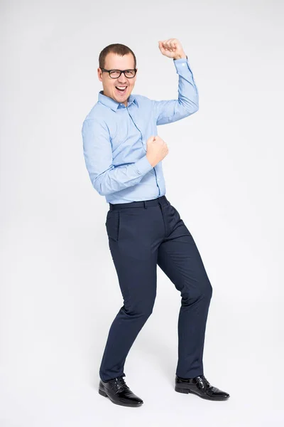 Portrait Young Cheerful Businessman Celebrating Something Dancing Gray Background — Stock Photo, Image