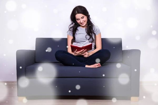Winter Leisure Concept Happy Woman Sitting Sofa Reading Book — Stock Photo, Image