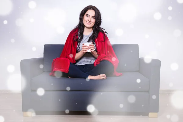 Winter Concept Young Woman Sitting Sofa Mug Tea Wrapped Red — Stock Photo, Image