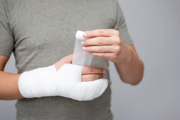 Fracture First Aid Concept Close Young Man Bandaging His Hand — Stock Photo, Image