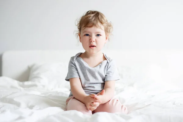 Portrait Funny Displeased Cute Little Girl Sitting Bed Home — Stock Photo, Image