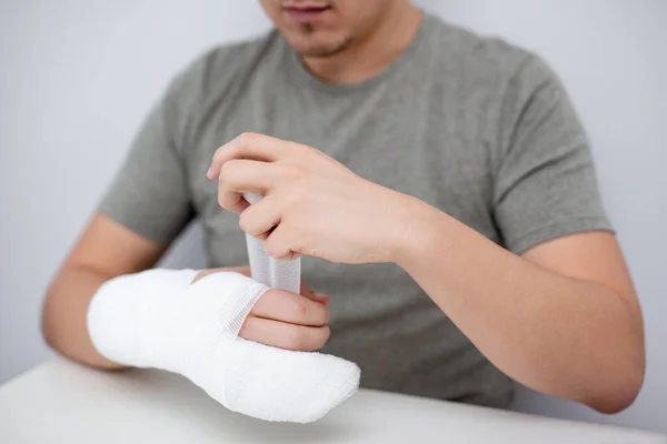 Fracture First Aid Concept Close Young Man Bandaging His Hand — Stock Photo, Image