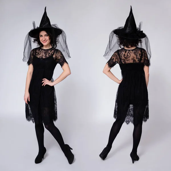 Siyah Cadı Cadılar Bayramı Kostümü Giymiş Beyaz Arka Planda Poz — Stok fotoğraf