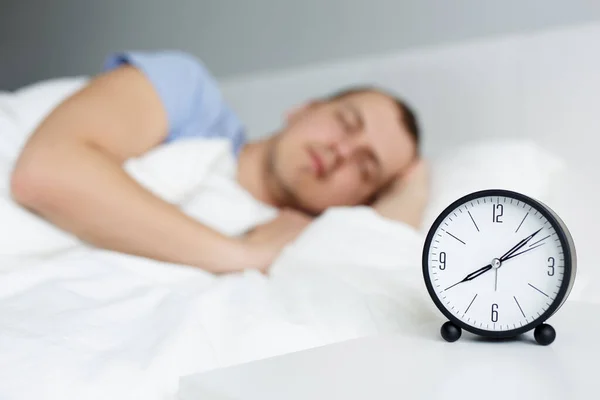 Relaxation Time Concept Close Alarm Clock Bedside Table Young Man — Stock Photo, Image