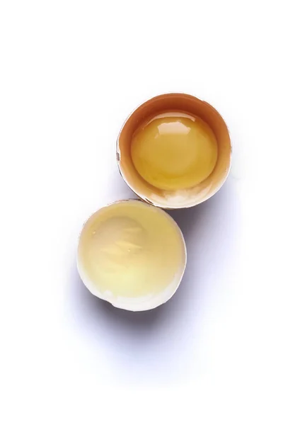 Cracked egg isolated on white background — Stock Photo, Image