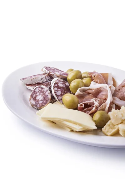 Cold meat and cheese on a plate — Stock Photo, Image