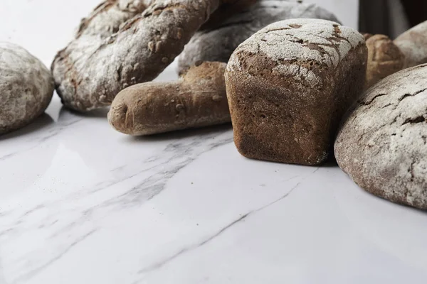 Verios bread on marble background — Stock Photo, Image