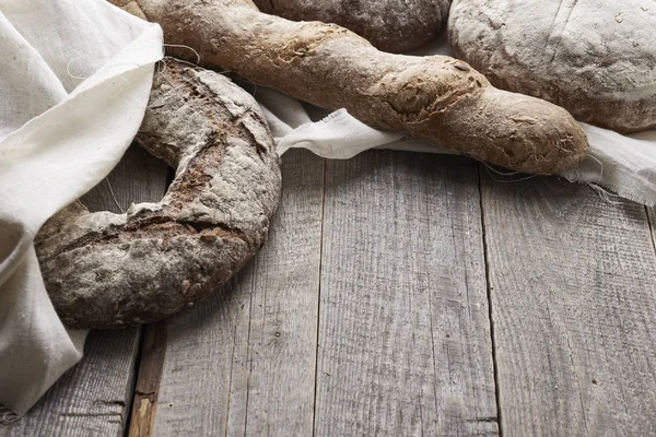 Verios bread on wooden background — Stock Photo, Image