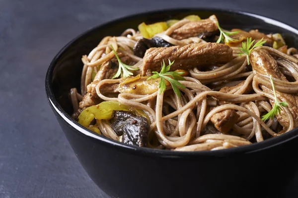 Fried pork with soba in asian style — Stock Photo, Image