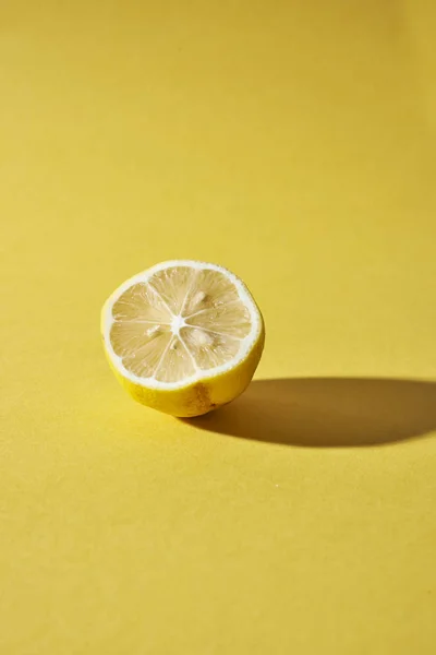 Lemon on yellow background — Stock Photo, Image