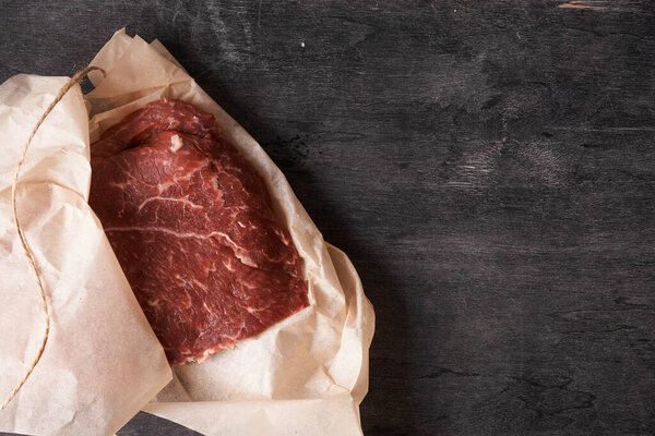 fresh beef in wrapped paper