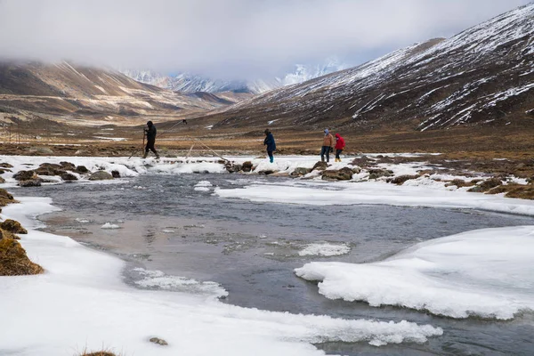 Snow flake beside River from snow ice melt on mountain Landscape view at Zero-Point, fog and mist weather day time, Sikkim, North India