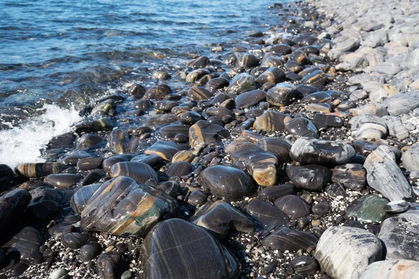 A strand körül gyönyörű aprókavicsos kő — Stock Fotó