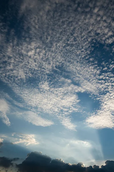 Sun rays through clouds like an dramatic explosion , power natur