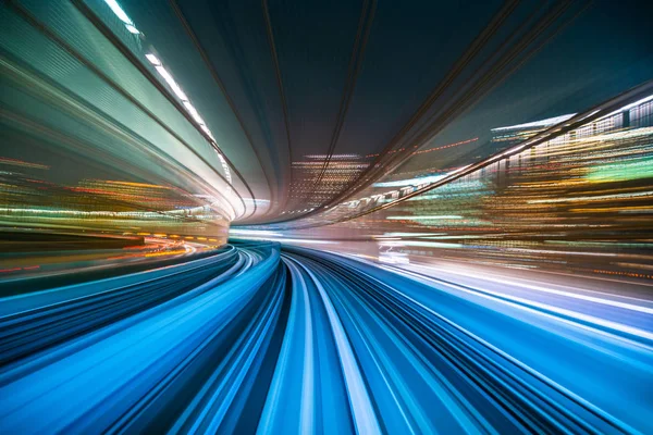 Desenfoque de movimiento de la línea Yurikamome que se mueve dentro del túnel en Tokio , — Foto de Stock