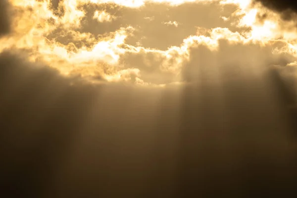 Sunray thought cloud from above show background dramatic from sunset