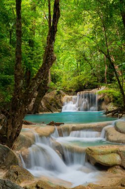 Erawan Waterfall in Thailand is locate in Kanchanaburi Provience clipart