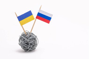 Economic and politic conflict betwen Ukraine and Russia, illustration with hand made flags clipart