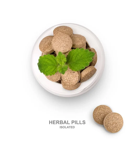Isolate herbal pills in an open bottle. Top view. — Stock Photo, Image