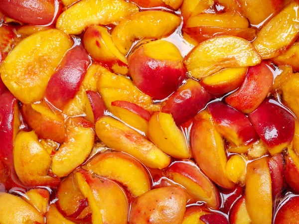 Fondo de fruta. Melocotones rebanados para hacer mermelada. Concepto alimenticio . — Foto de Stock