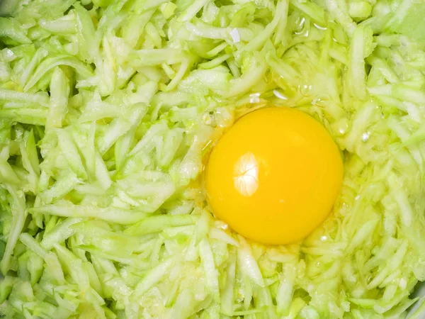 Cooking process: grated zucchini, egg. Raw materials for the pre