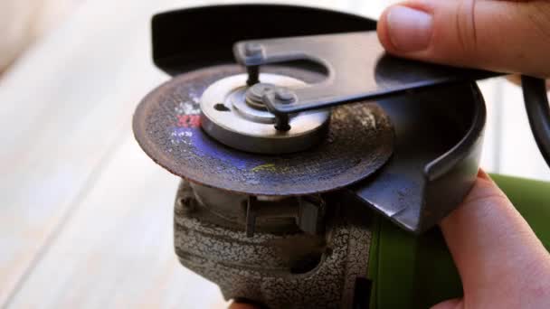 Unscrewing the Disc in an Angle Grinder. Close-up — Stockvideo