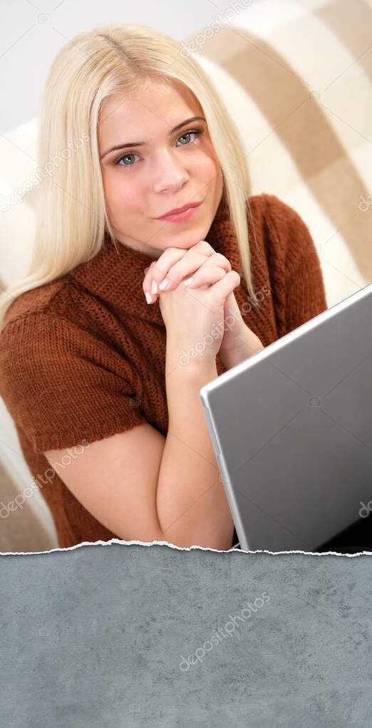 Young blonde woman with laptop computer