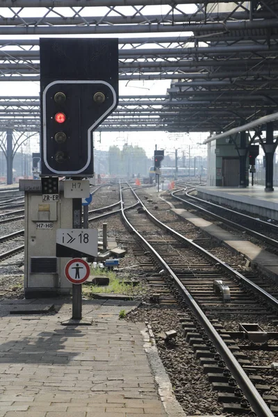 Rail tracks and trains in the Brussels South Railway Station