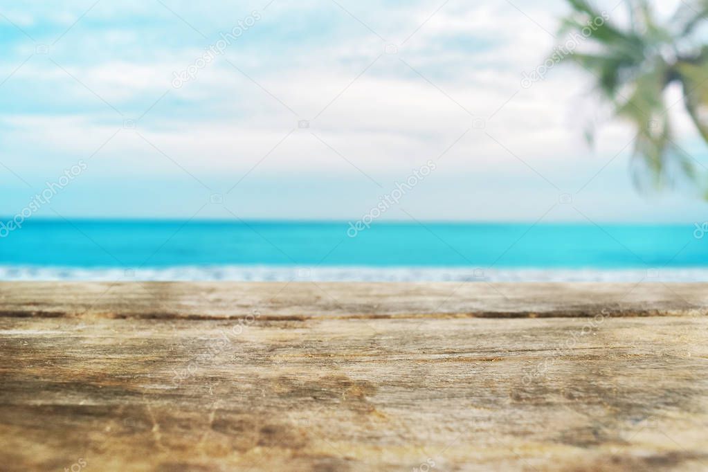 Empty wooden table on the beach