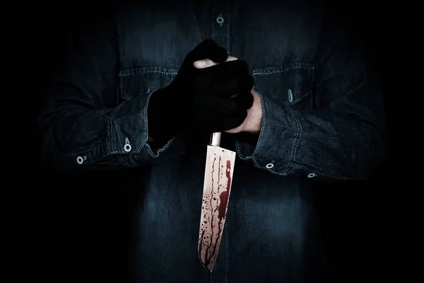 Killer with a bloody knife