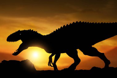 Dinozor silueti, gün batımında Tyrannosaurus Rex