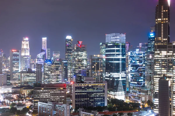 Skyskraber og skyline i Singapore city night . - Stock-foto