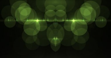 Ekranda dans eden açık renkli ışınlar