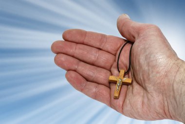 El ahşap bir haç ile