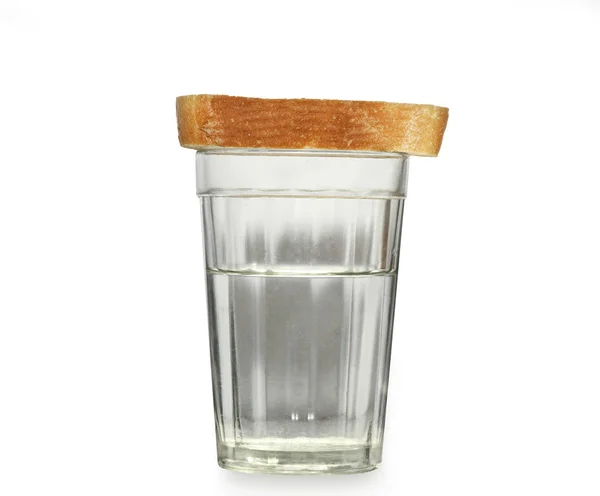 Szklanką wody i chleba — Zdjęcie stockowe