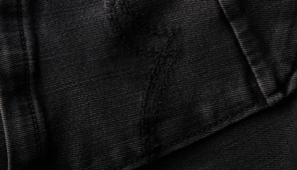 黒のジーンズ テクスチャ背景 — ストック写真