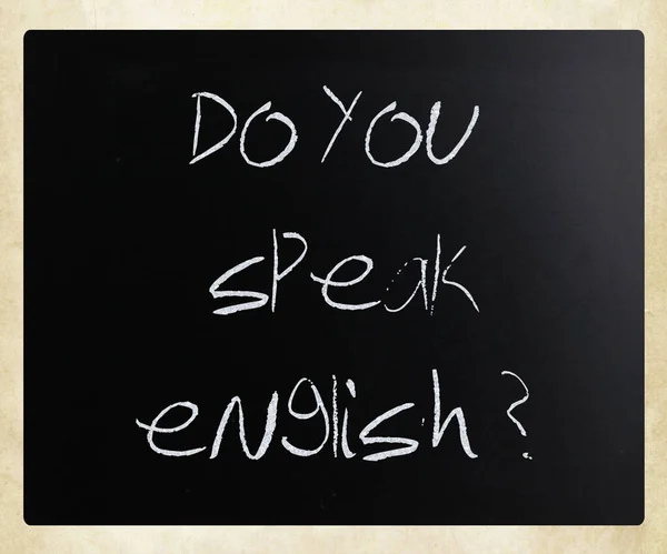 "Do you speak english "handwritten with white chalk on a blackbo — стоковое фото