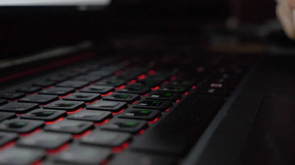 Close-up view fingers tapping keypad of laptop and writing message — Stock Photo, Image