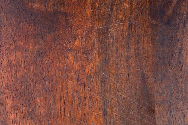 Kahverengi ahşap yapısı doğal ağaçtan geliyor. Güzel desenli, soyut ahşap panel.