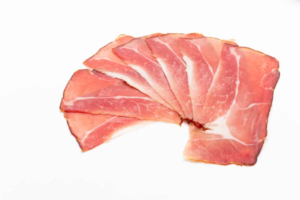 Hamon sliced on white background. Spanisch traditional meat. — Stock Photo, Image