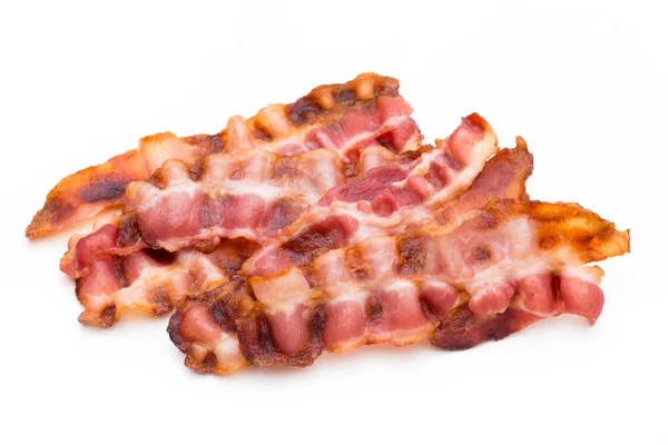 Vařené slaninové vyrážky izolované na bílém. — Stock fotografie
