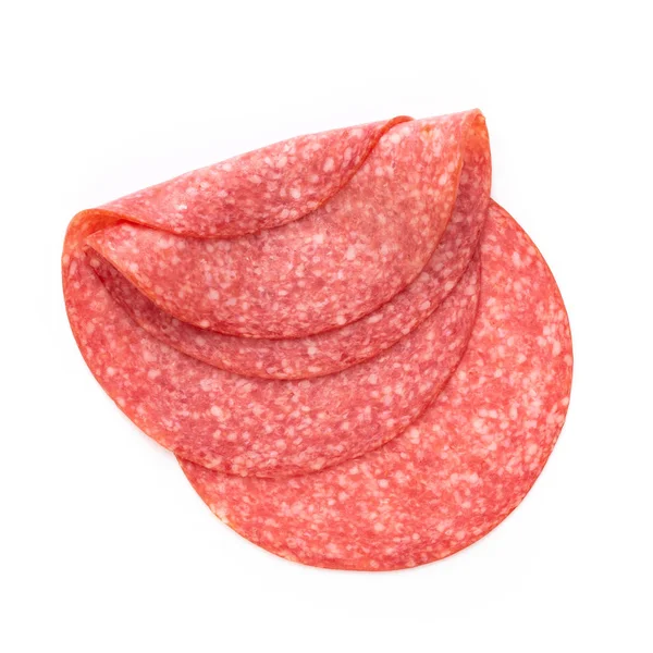 Fette di salame su sfondo bianco. — Foto Stock